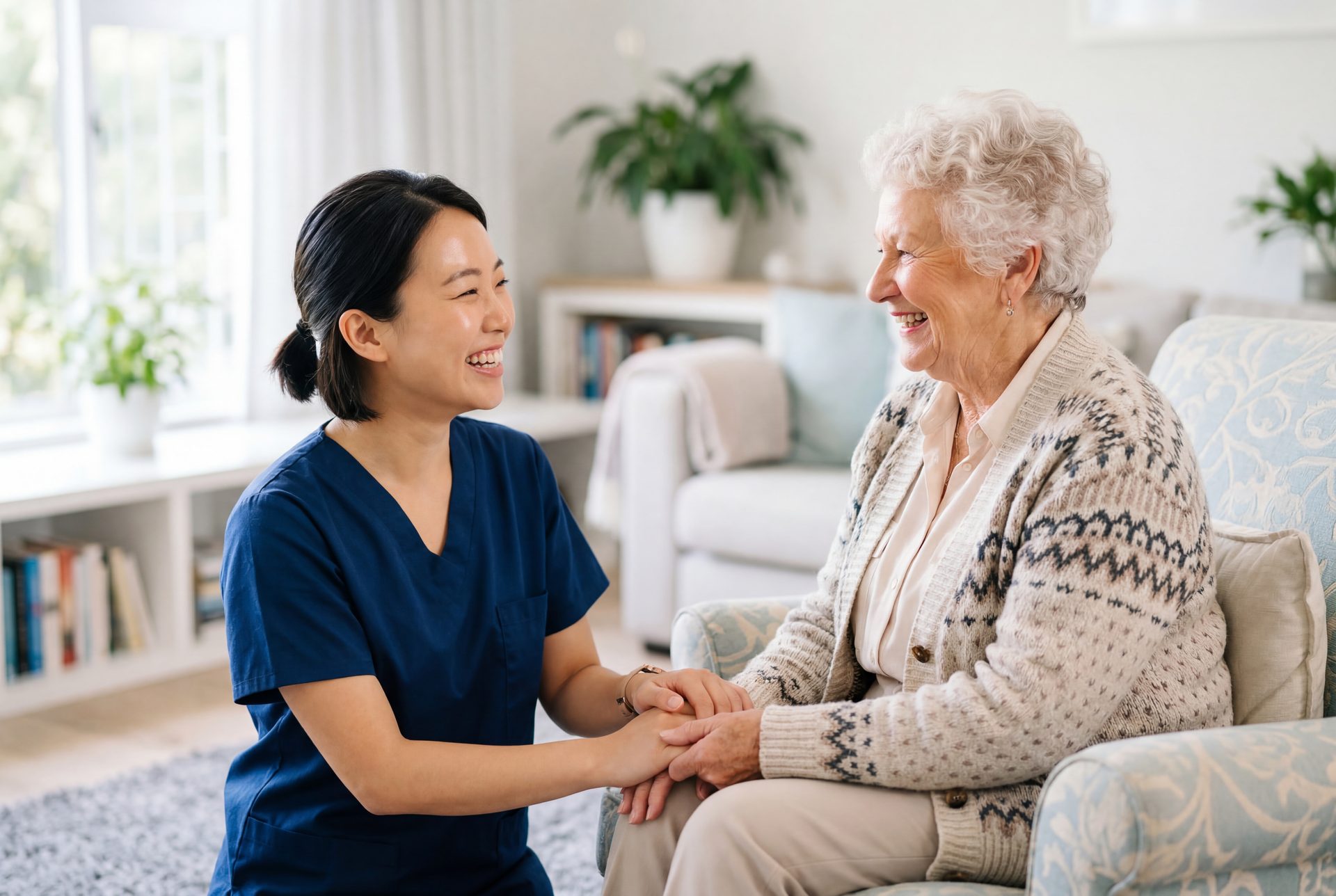 Companion holding hands with a senior at home